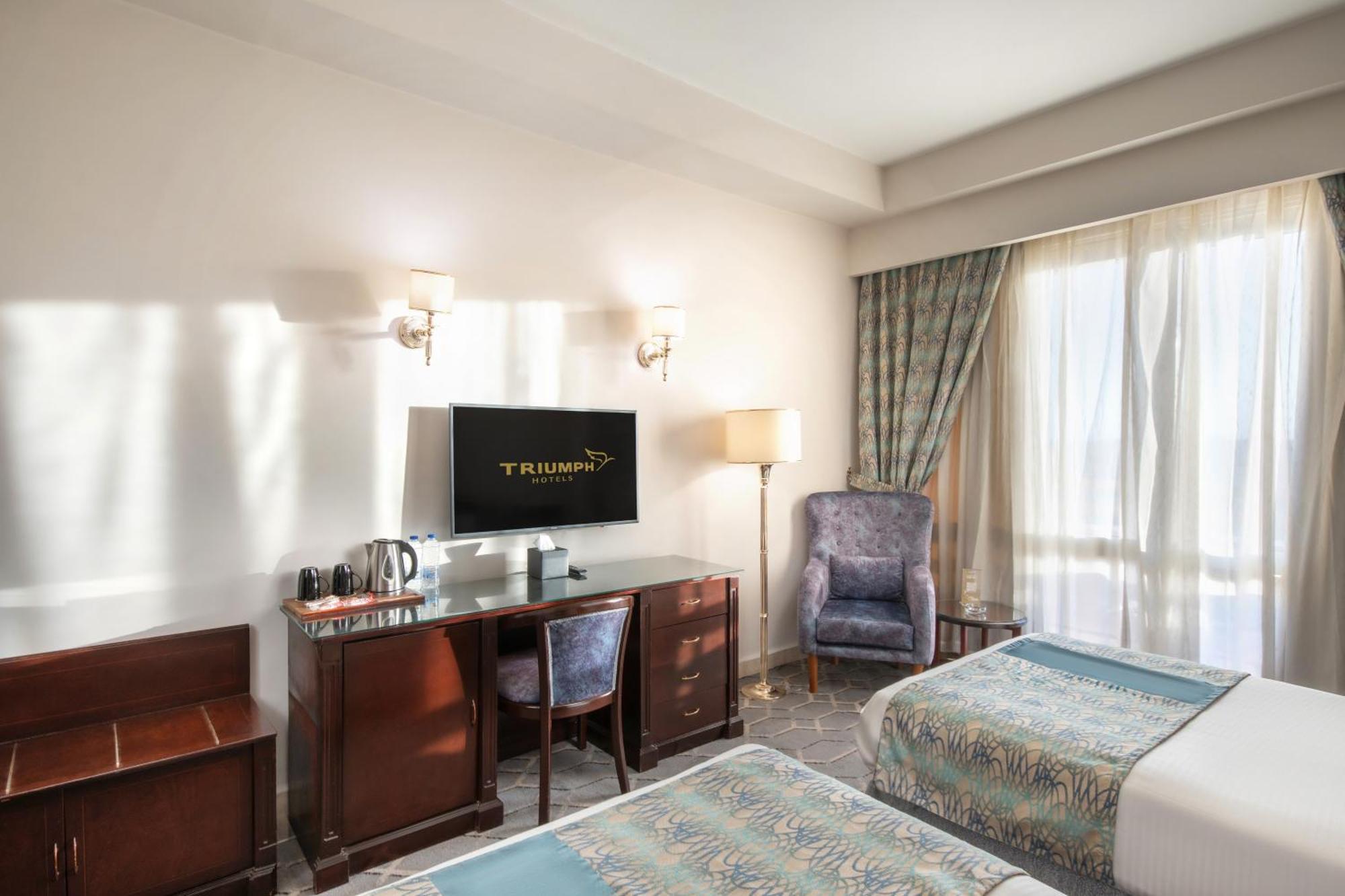ไทรอัมพ์ พลาซา โฮเต็ล Hotel ไคโร ห้อง รูปภาพ